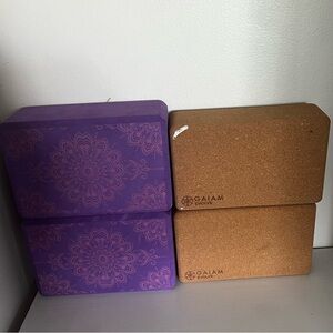 2 tan and 2 purple yoga blocks
